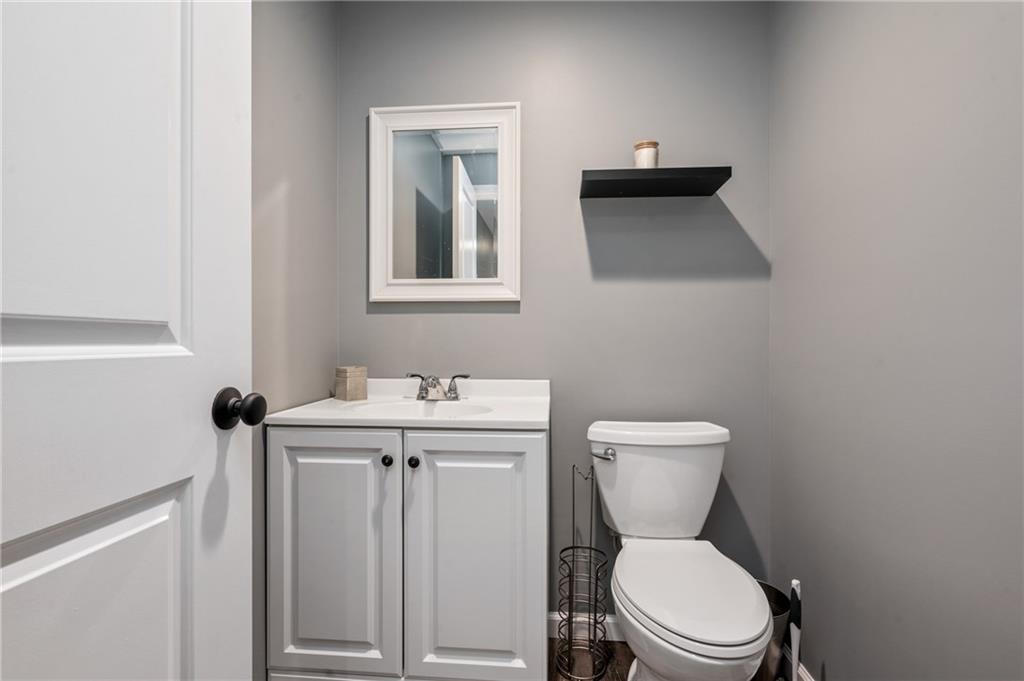 230 James Patrick Place Zelienople, PA 16063 - Photo 25 of 34 a bathroom with a toilet a sink and mirror