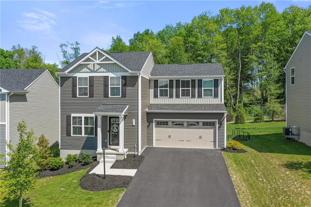 230 James Patrick Place Zelienople, PA 16063 - Photo 34 of 34 front view of a house with a yard