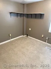 a view of a room with an empty space