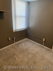21 Union Street Plainfield, CT 06354 - Photo 7 of 7 a view of a room with a window