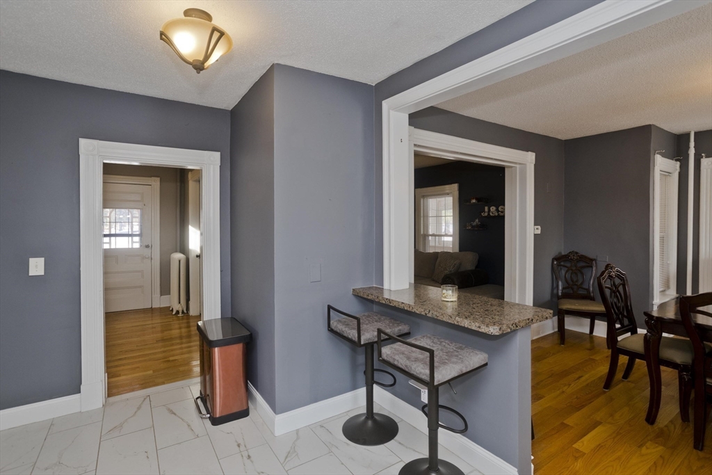 60 Mill Street Westfield, MA 01085 - Photo 15 of 42 a workspace with furniture and wooden floor