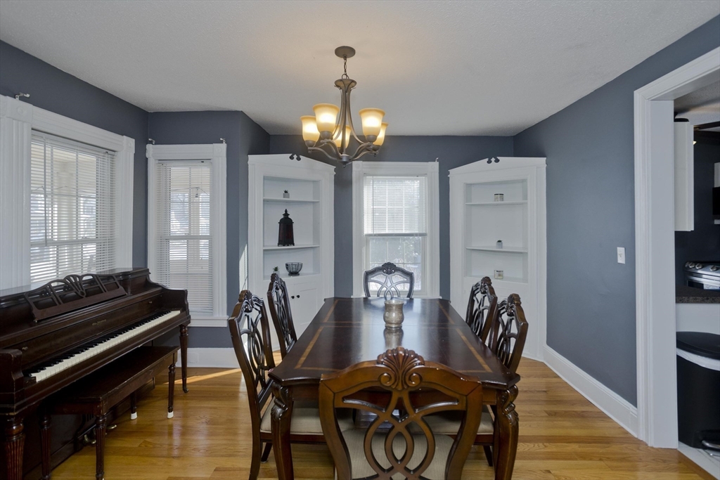 60 Mill Street Westfield, MA 01085 - Photo 17 of 42 a view of a dining room with furniture and chandelier