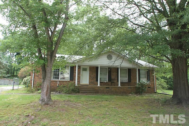 4616 Waterbury Road Raleigh, NC 27604 - Photo 1 of 12 a front view of a house with a garden