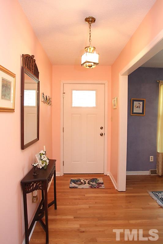 4616 Waterbury Road Raleigh, NC 27604 - Photo 2 of 12 a view of a livingroom with furniture and bathroom