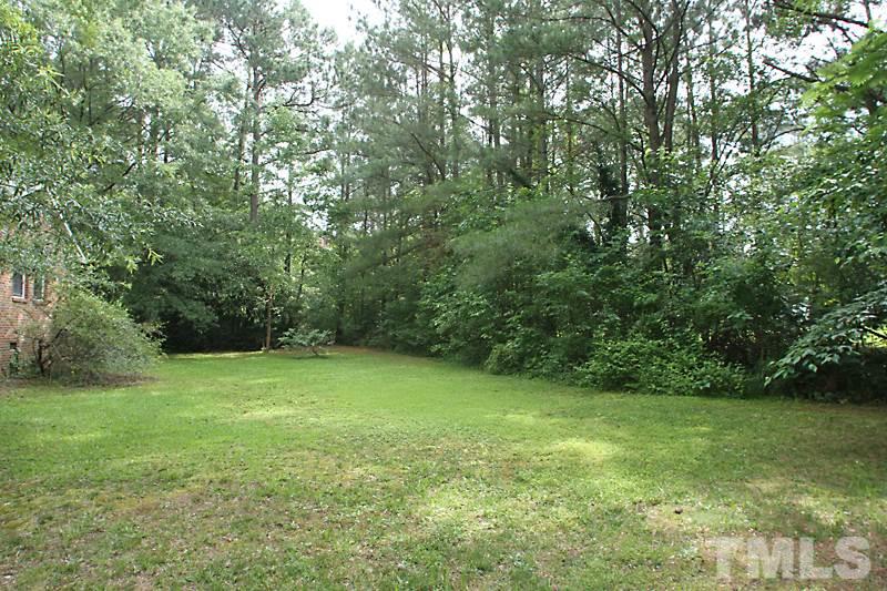4616 Waterbury Road Raleigh, NC 27604 - Photo 11 of 12 a view of a green yard