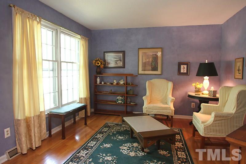 4616 Waterbury Road Raleigh, NC 27604 - Photo 3 of 12 a living room with furniture and a window