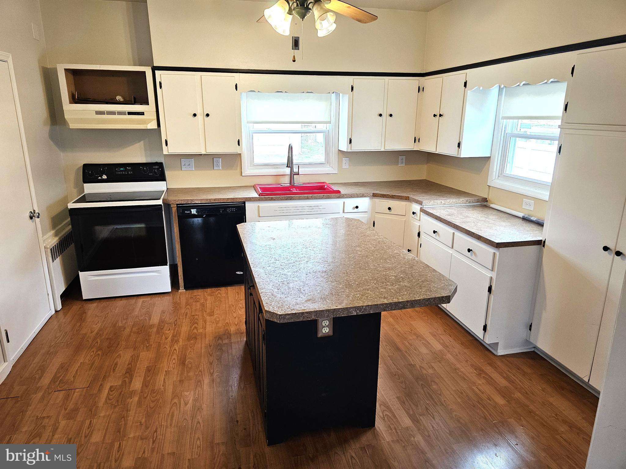 75 King Street Milroy, PA 17063 - Photo 3 of 19 a kitchen with stainless steel appliances granite countertop a sink window and cabinets