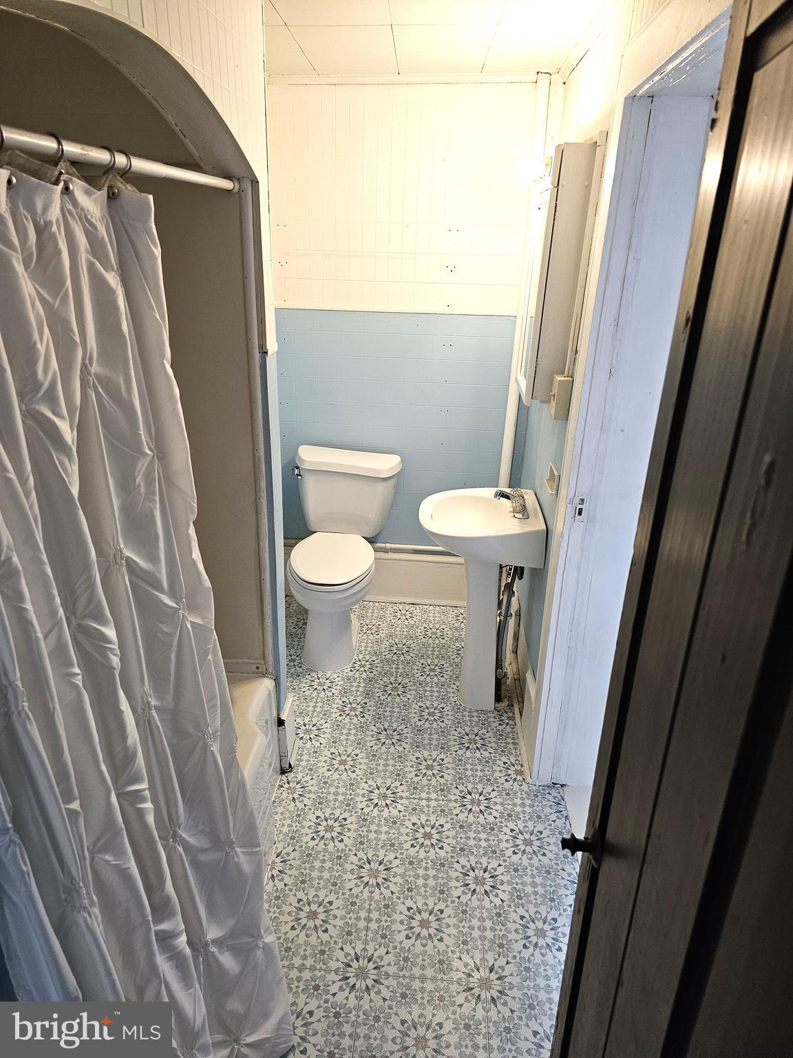 75 King Street Milroy, PA 17063 - Photo 9 of 19 a bathroom with a toilet and a shower