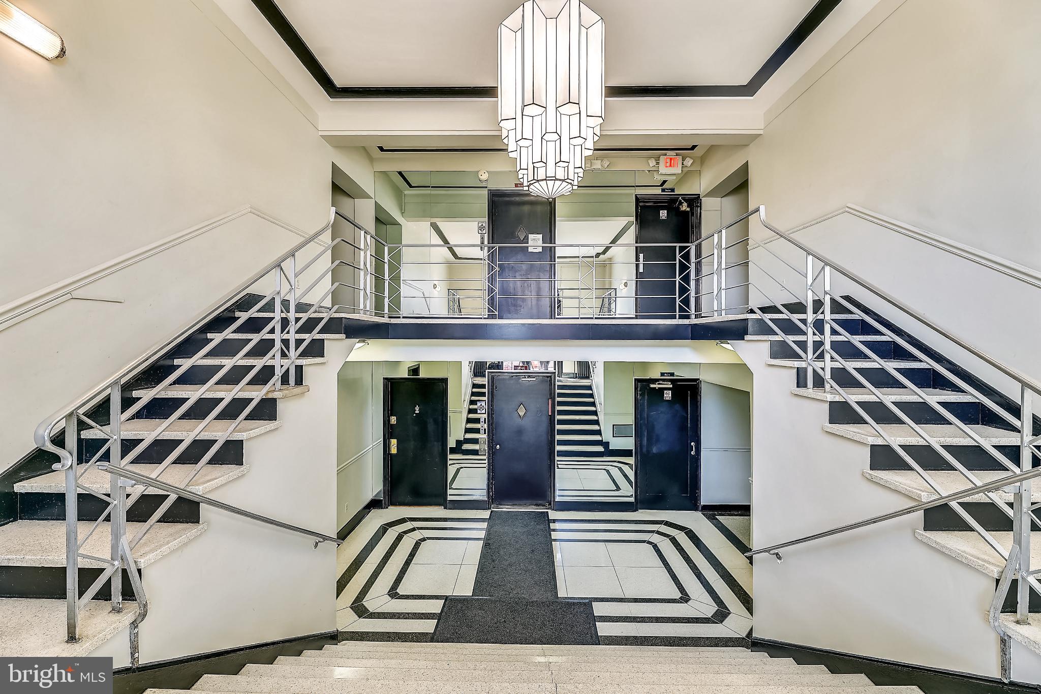 1365 Kennedy Street Northwest, Unit 209 Washington, DC 20011 - Photo 27 of 35 a view of a entryway with a chandelier