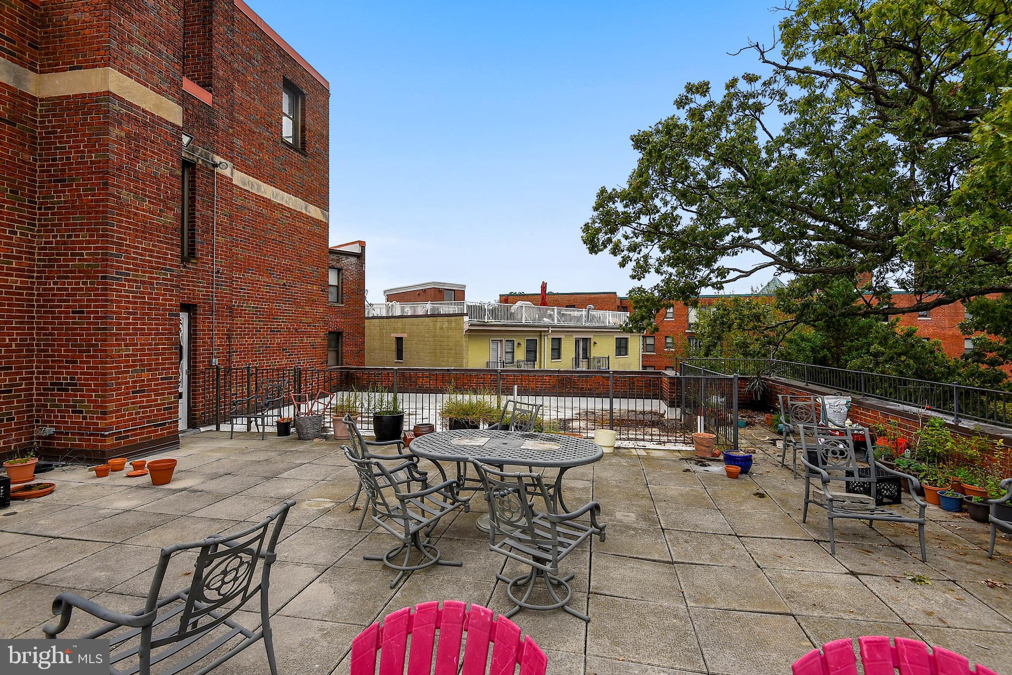 1365 Kennedy Street Northwest, Unit 209 Washington, DC 20011 - Photo 32 of 35 a view of city from terrace with seating space