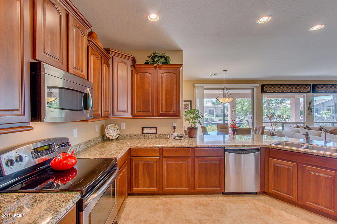 42377 Abbey Road Maricopa, AZ 85138 - Photo 7 of 48 Staggered Cherry Cabinets