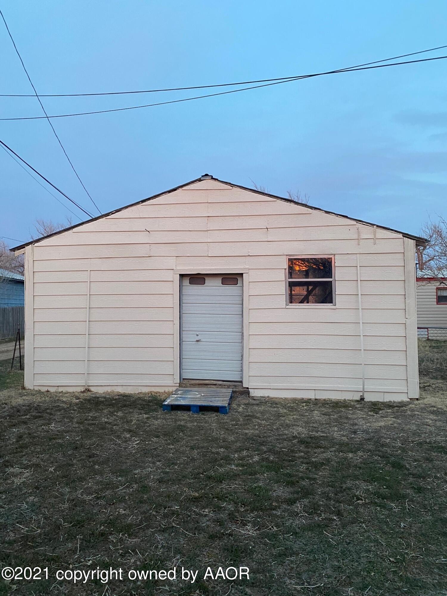 8111 Triangle Drive Amarillo, TX 79107 - Photo 16 of 18 back yard stg bldg