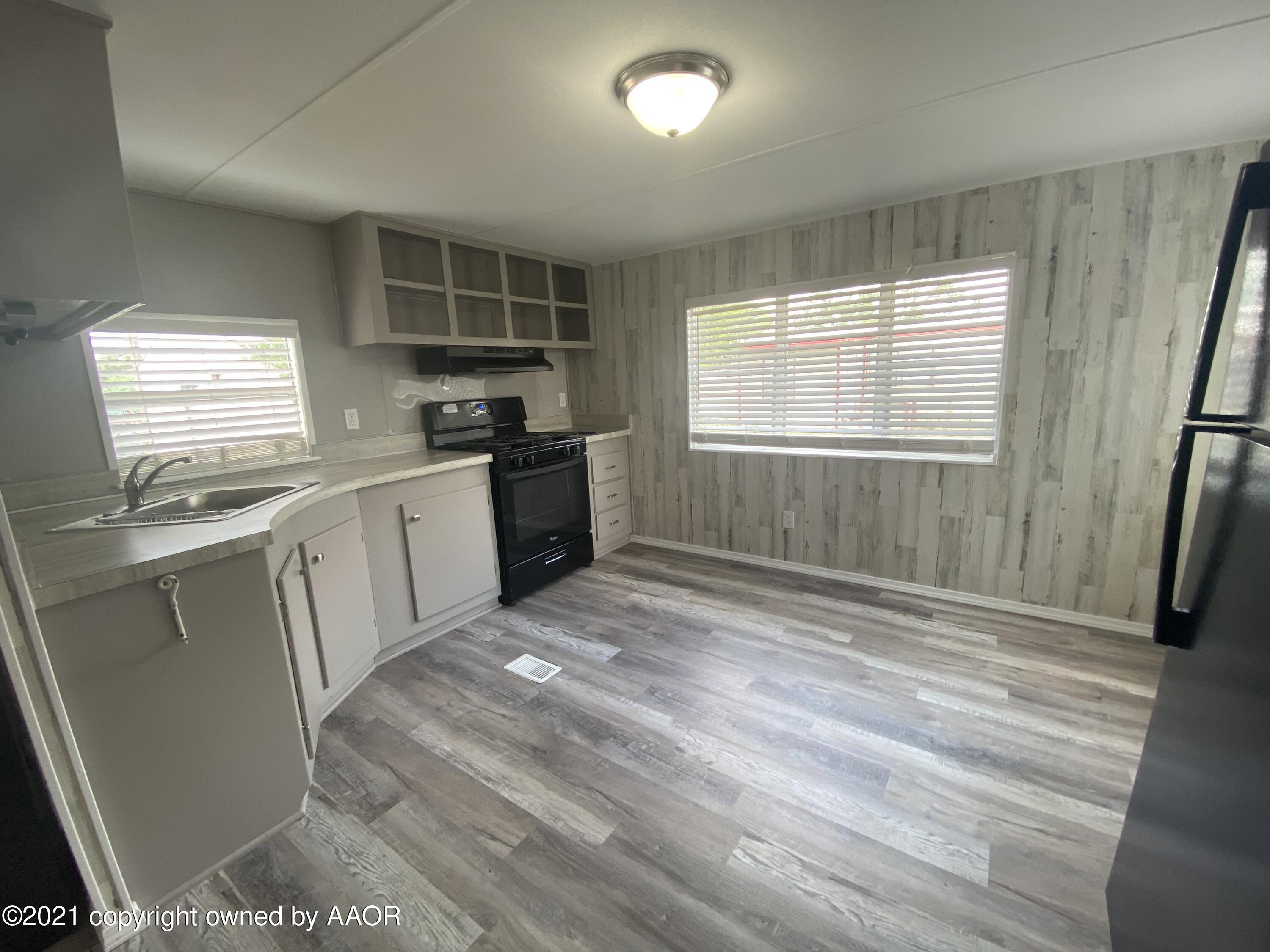 8111 Triangle Drive Amarillo, TX 79107 - Photo 3 of 18 light/bright kitchen