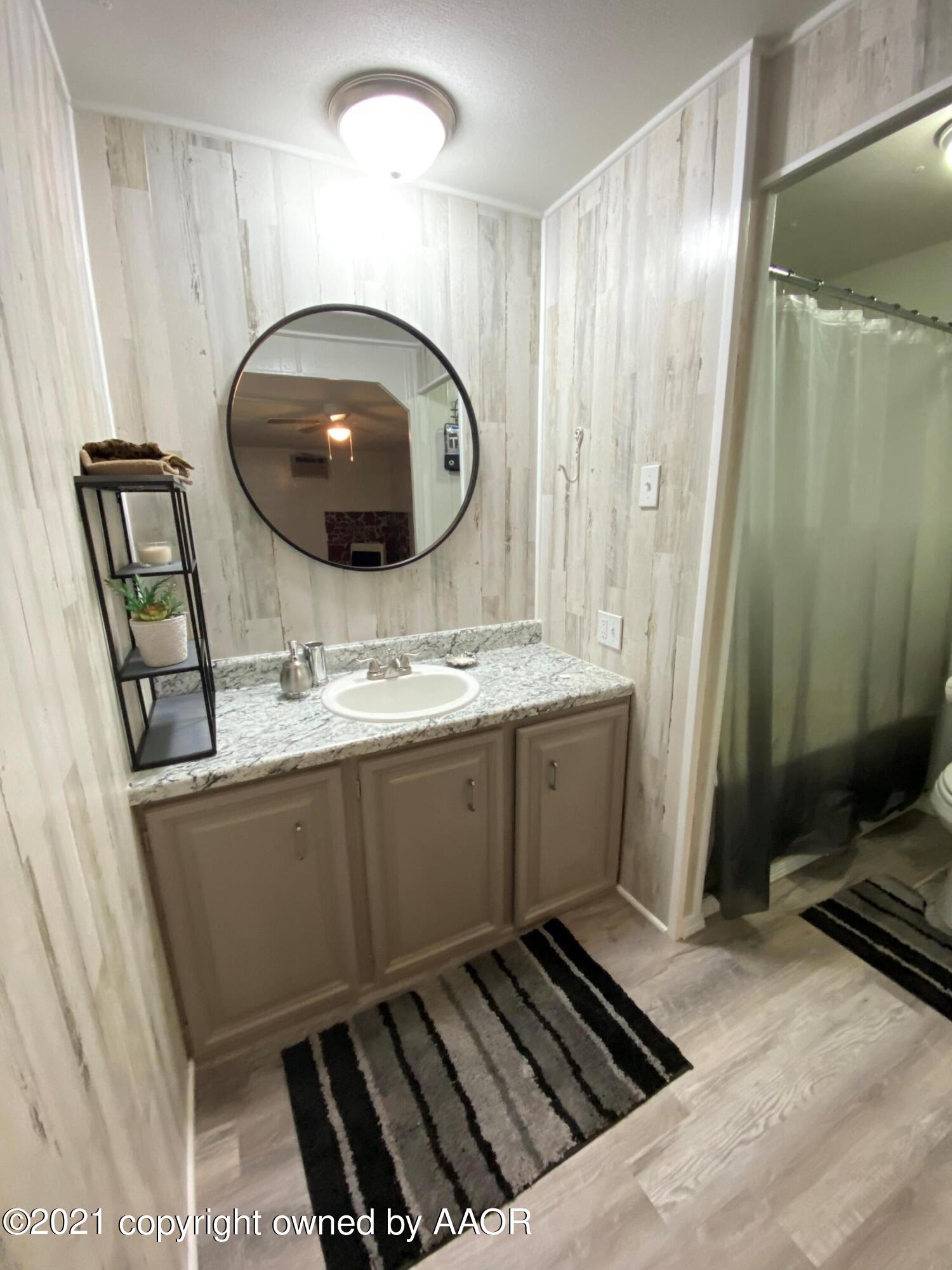 8111 Triangle Drive Amarillo, TX 79107 - Photo 8 of 18 master vanity & tub/shwr bathroom