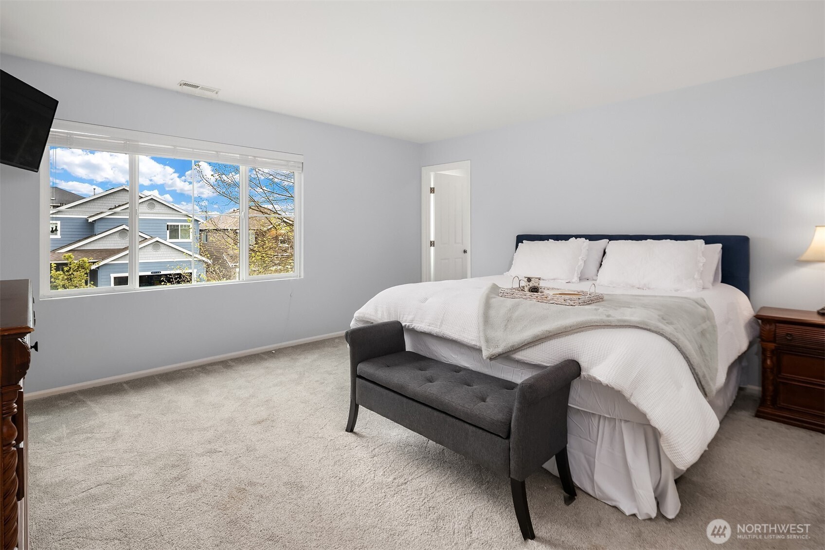 4119 167th Place Southeast Bothell, WA 98012 - Photo 18 of 39 a bedroom with a bed and window