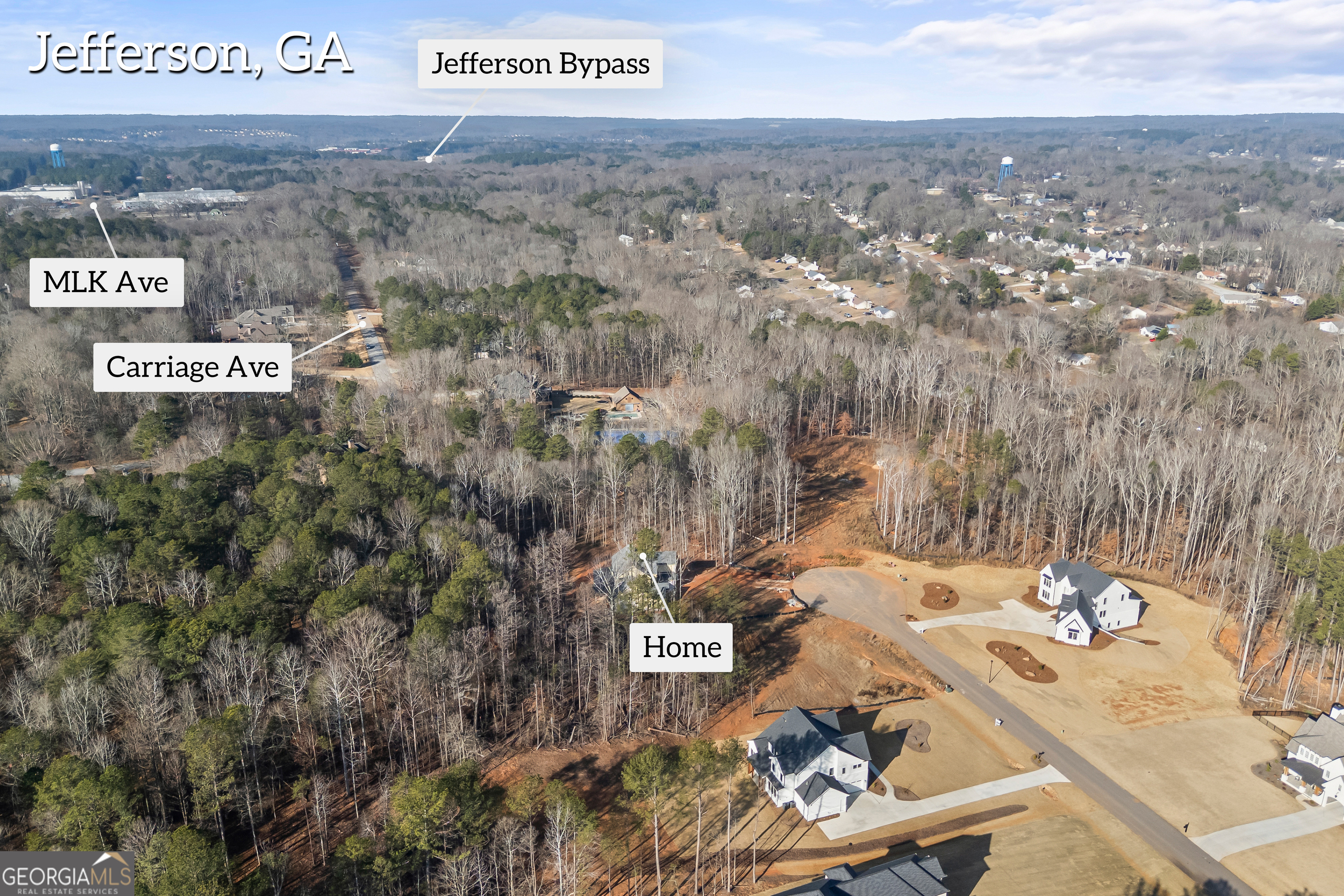 205 Chariot Court Jefferson, GA 30549 - Photo 4 of 23 a view of a city with sign board