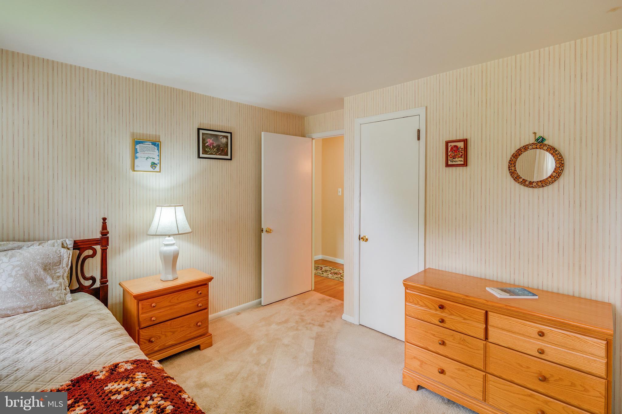 110 Courtland Road Cherry Hill, NJ 08034 - Photo 13 of 28 a bedroom with a bed and cabinets