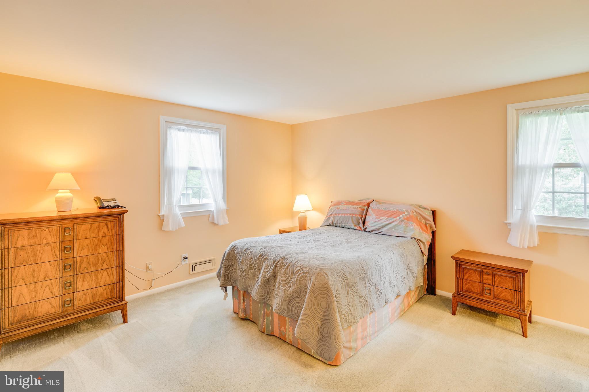 110 Courtland Road Cherry Hill, NJ 08034 - Photo 14 of 28 a bedroom with a bed and cabinets