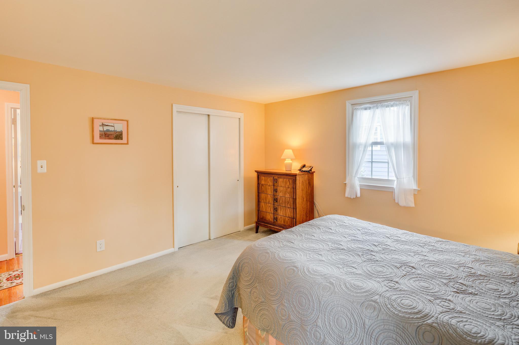 110 Courtland Road Cherry Hill, NJ 08034 - Photo 15 of 28 a bedroom with a bed and wooden floor