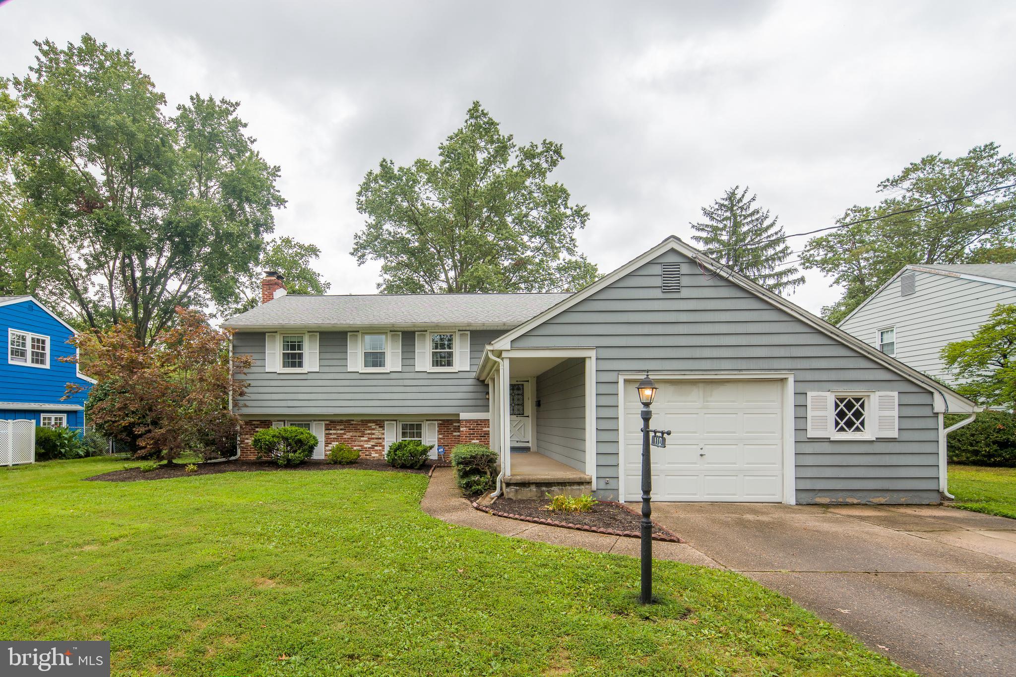 110 Courtland Road Cherry Hill, NJ 08034 - Photo 2 of 28 a front view of a house with a garden