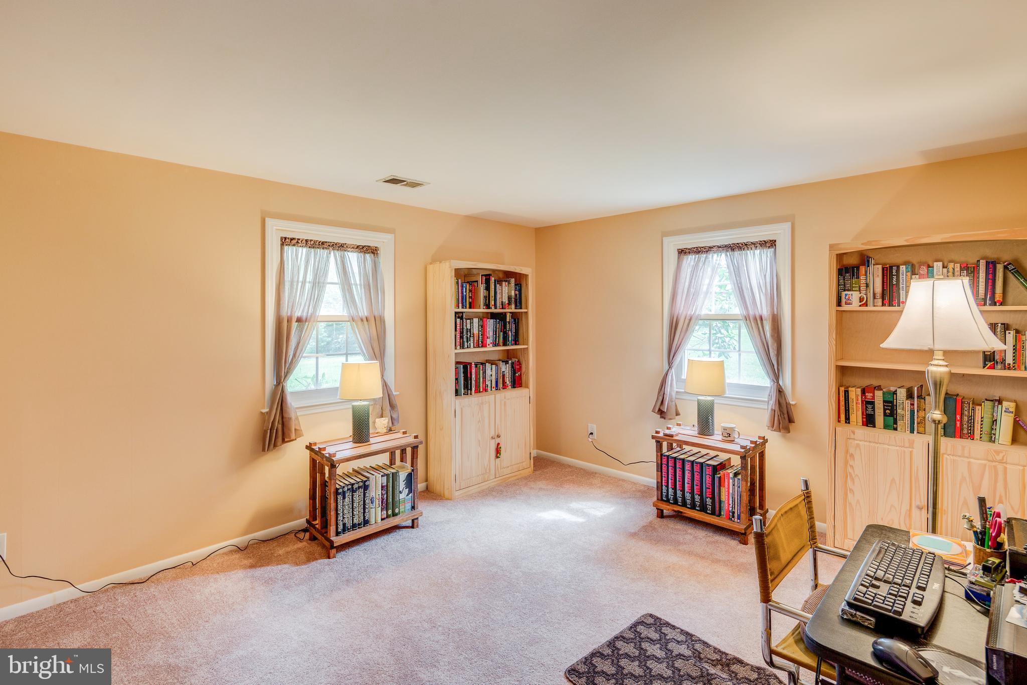 110 Courtland Road Cherry Hill, NJ 08034 - Photo 23 of 28 a living room with furniture a rug and a window