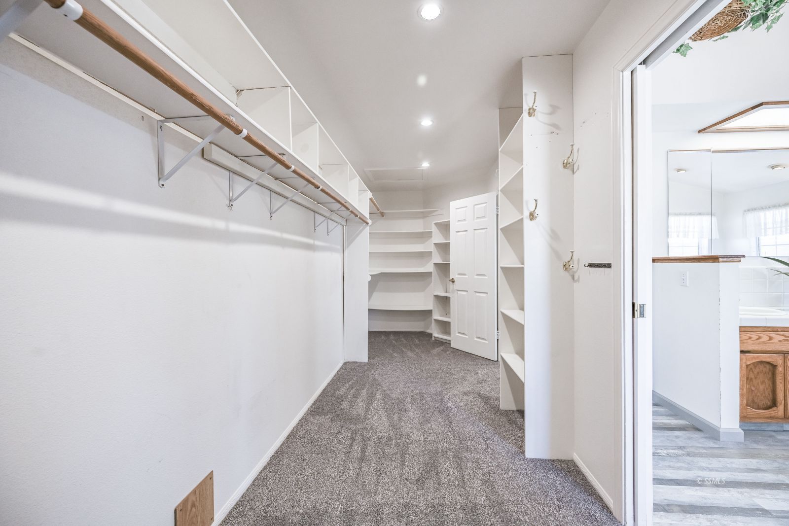 1209 West Robert Avenue Ridgecrest, CA 93555 - Photo 41 of 50 a view of a hallway with white walls and entryway