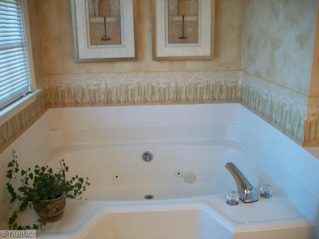 1640 Slane Road Clemmons, NC 27012 - Photo 10 of 16 Master Bath/Spa. Master bath jetted tub, separate shower,double sinks and tile floors.
