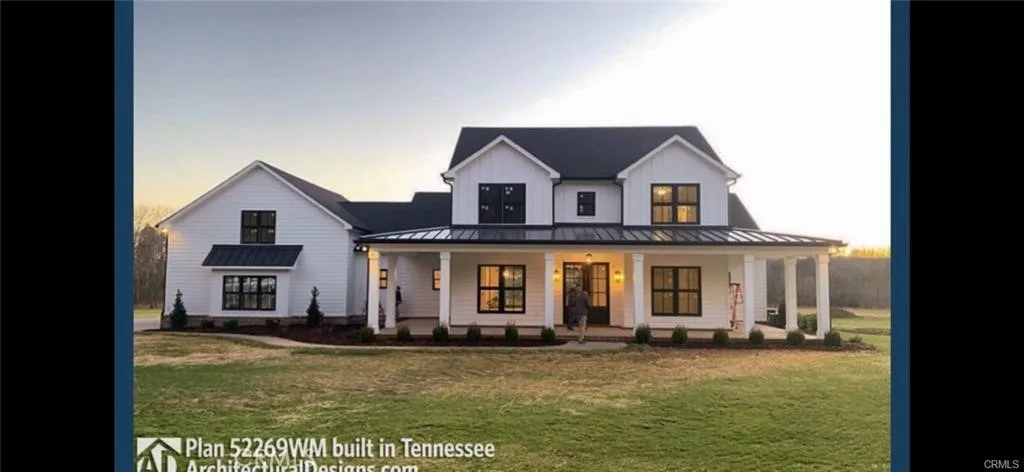 24925 Cindy Newhall, CA 91321 - Photo 3 of 8 a front view of a house with a yard