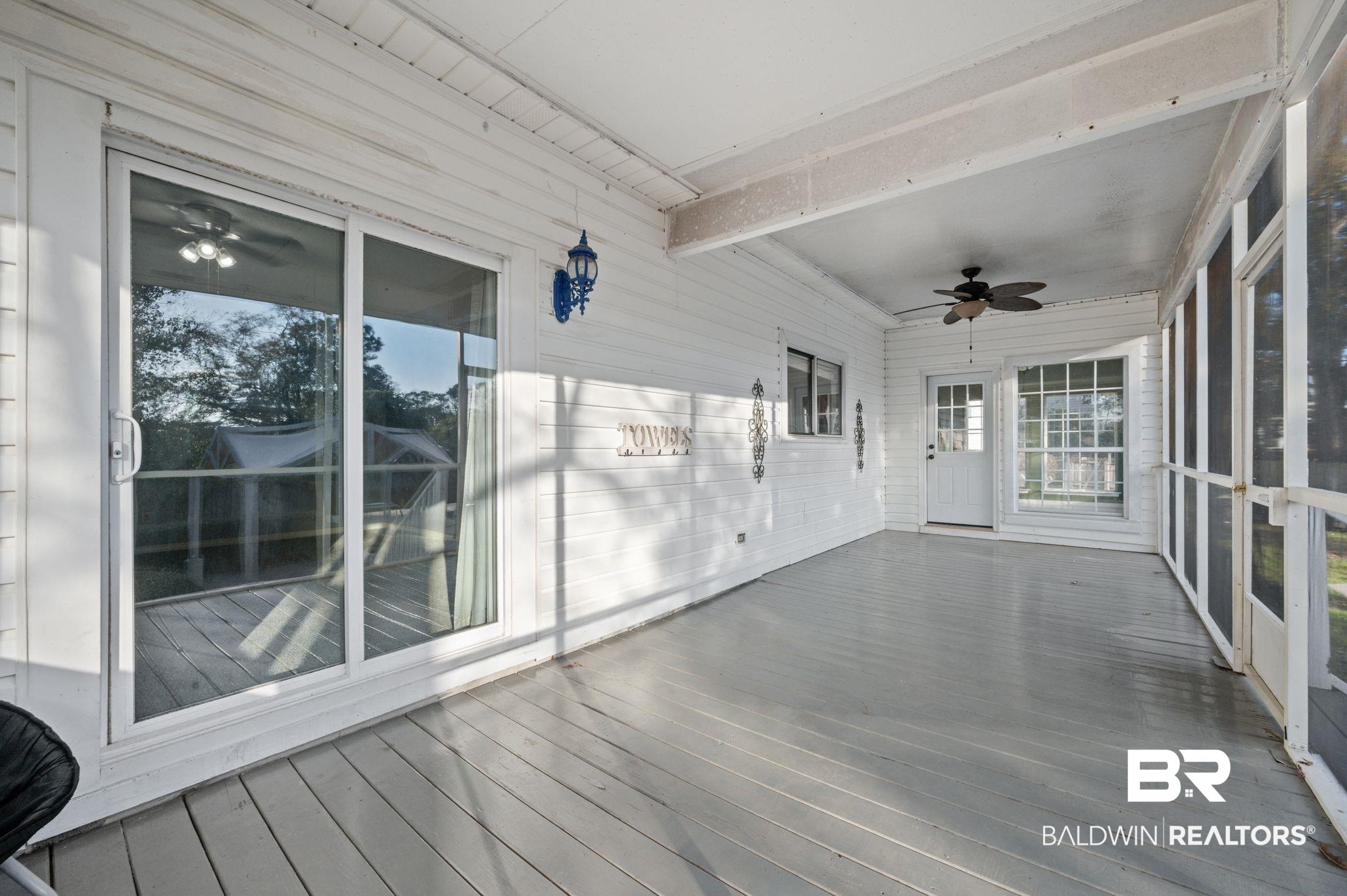 100 Orleans Way Daphne, AL 36526 - Photo 28 of 31 Unfurnished sunroom featuring beamed ceiling