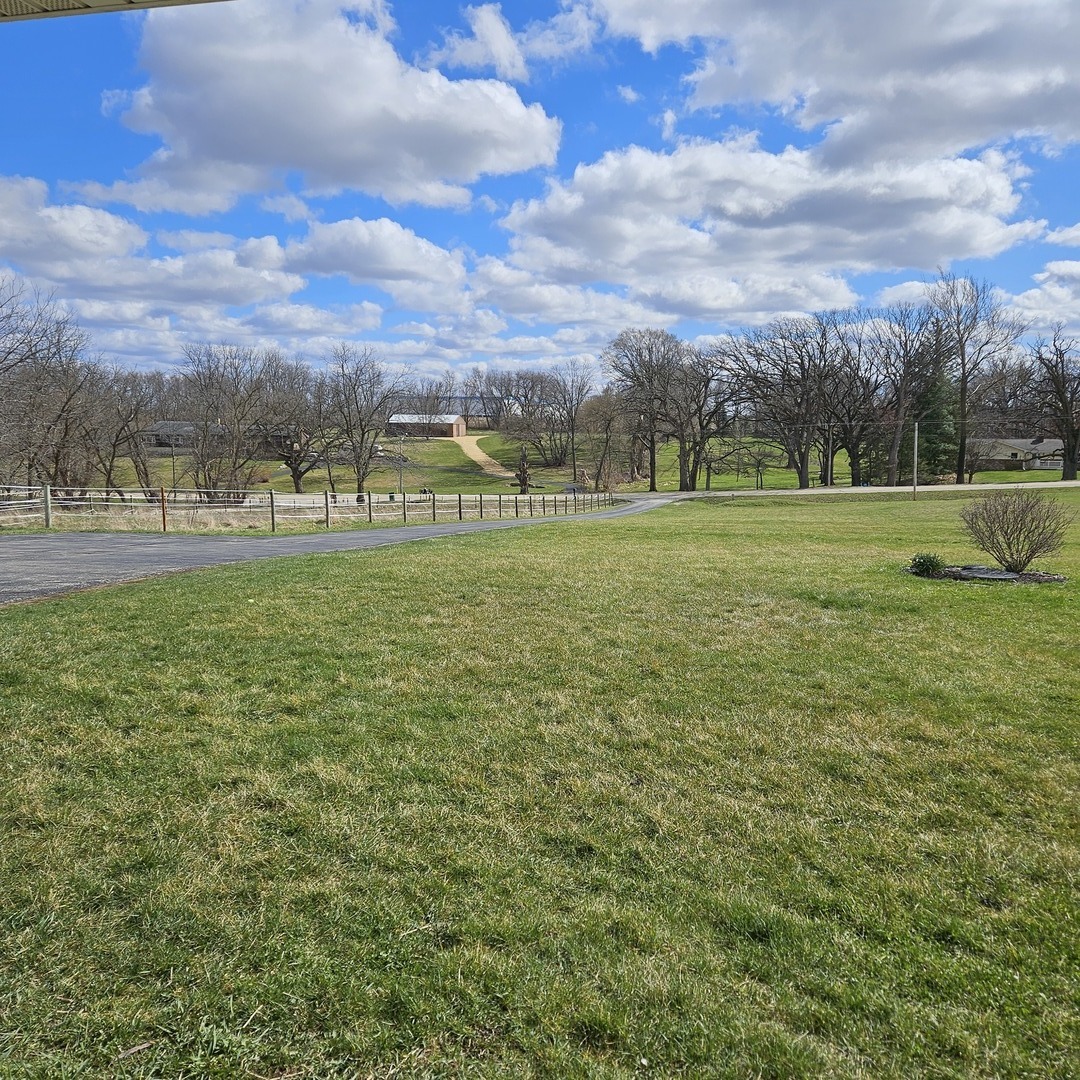 5096 Rotary Road Cherry Valley, IL 61016 - Photo 28 of 28 a view of large trees and a big yard