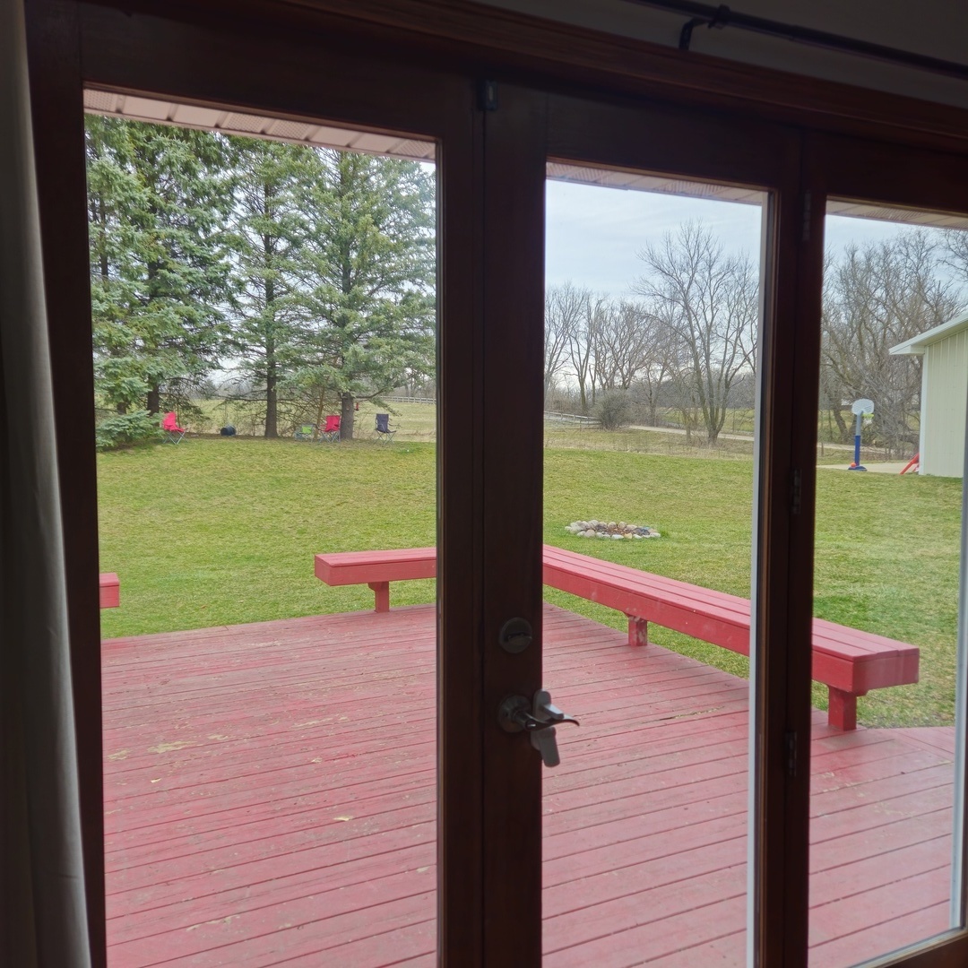 5096 Rotary Road Cherry Valley, IL 61016 - Photo 8 of 28 a view of a garden from a window