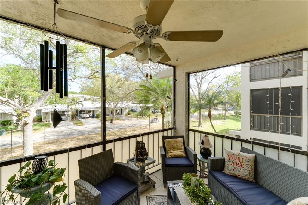 2100 Barkeley Lane, Unit 13 Fort Myers, FL 33907 - Photo 9 of 12 a view of a city from a balcony with furniture