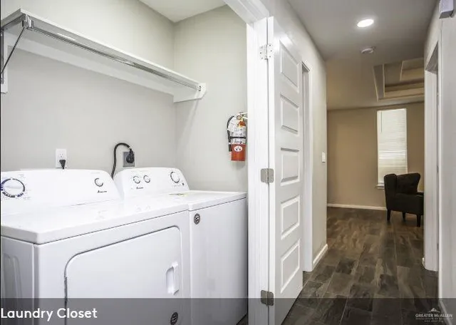 a utility room with dryer and washer