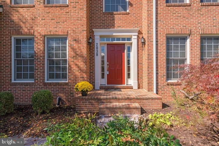 2038 Madrillon Road Vienna, VA 22182 - Photo 2 of 63 a view of house with outdoor seating space