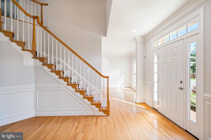 2038 Madrillon Road Vienna, VA 22182 - Photo 3 of 63 a view of staircase with wooden floor and floors
