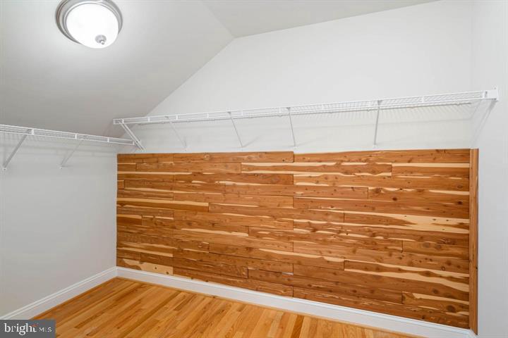 2038 Madrillon Road Vienna, VA 22182 - Photo 42 of 63 a view of a room with wooden floor