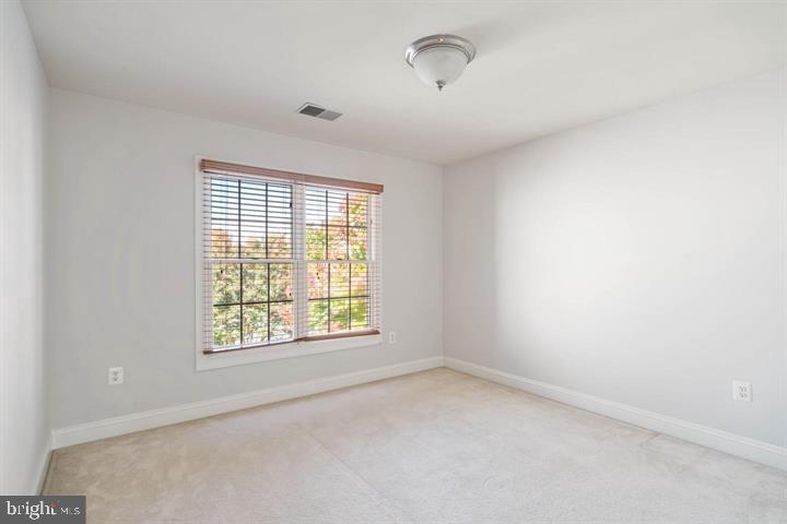2038 Madrillon Road Vienna, VA 22182 - Photo 48 of 63 an empty room with a window