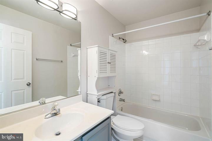 2038 Madrillon Road Vienna, VA 22182 - Photo 53 of 63 a bathroom with a sink toilet and shower