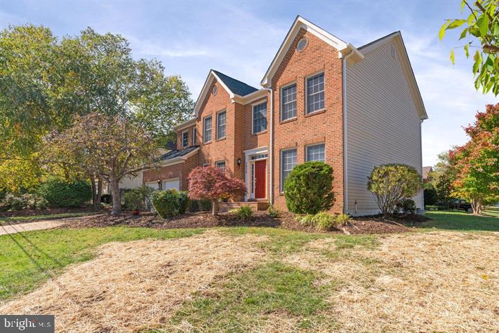 2038 Madrillon Road Vienna, VA 22182 - Photo 54 of 63 a front view of a house with garden
