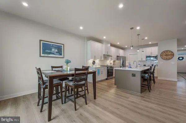 a view of kitchen with breakfast area