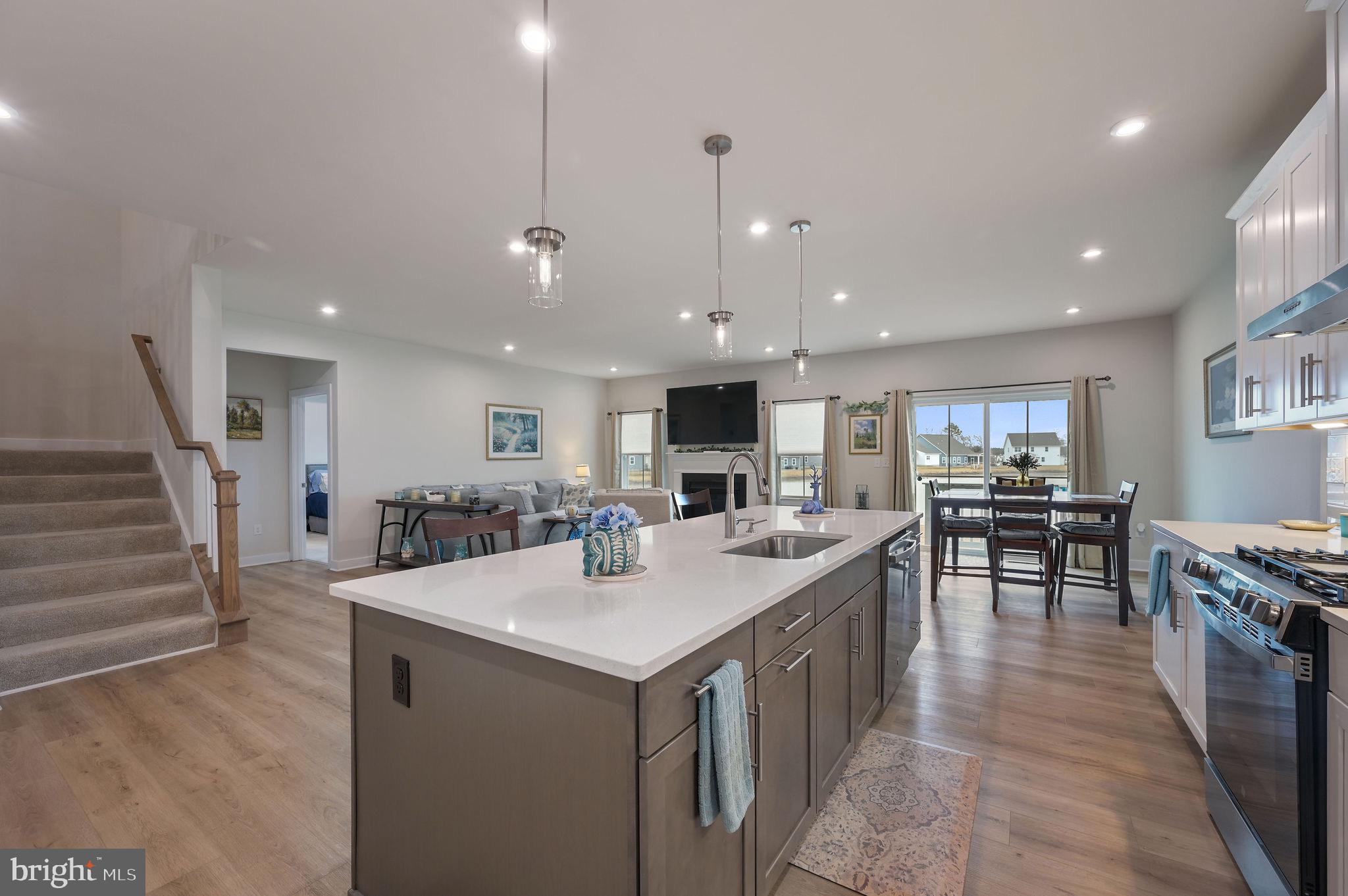 30366 Indigo Way Georgetown, DE 19947 - Photo 21 of 37 a large kitchen with a table and chairs
