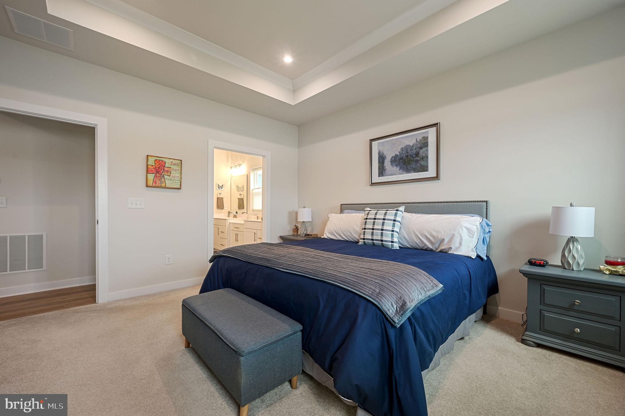 30366 Indigo Way Georgetown, DE 19947 - Photo 24 of 37 a spacious bedroom with a bed and window