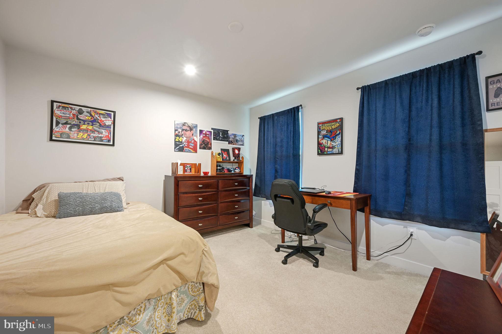 30366 Indigo Way Georgetown, DE 19947 - Photo 28 of 37 a bedroom with a bed and furniture