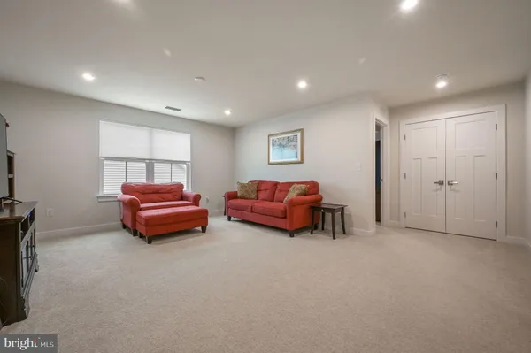 a living room with furniture and a couch