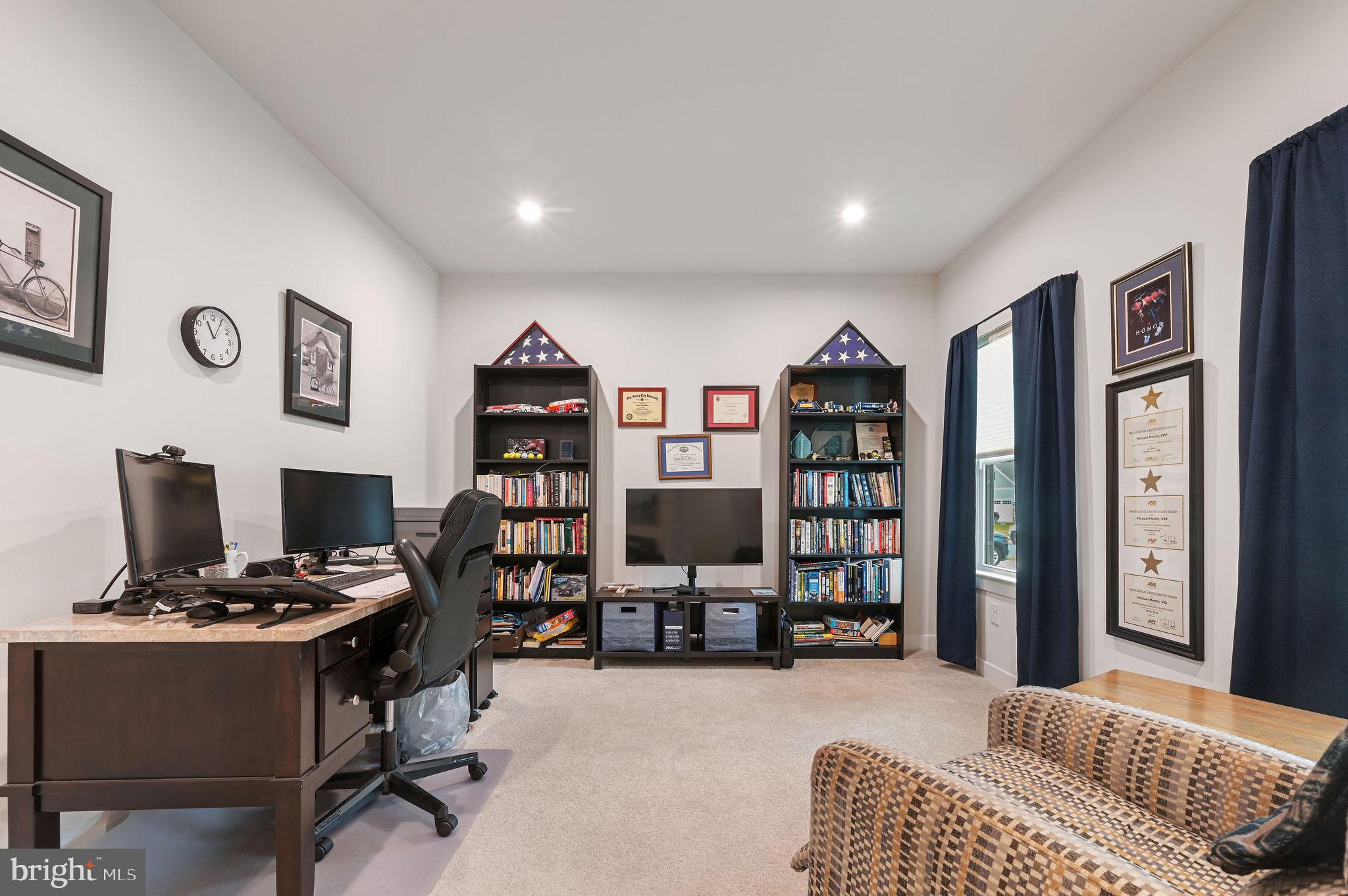30366 Indigo Way Georgetown, DE 19947 - Photo 6 of 37 a bedroom with furniture and a book shelf