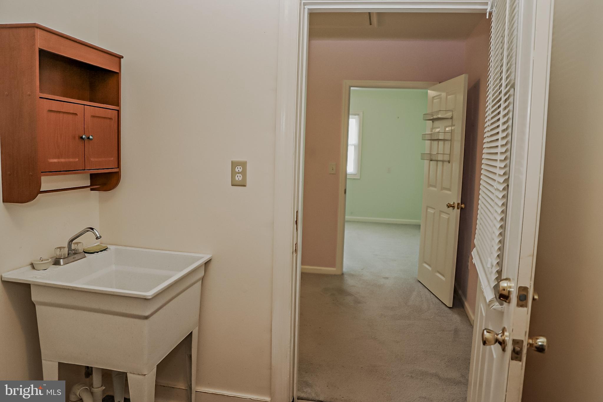 26741 Siloam Road Salisbury, MD 21801 - Photo 13 of 73 Utility closet has deep laundry tub