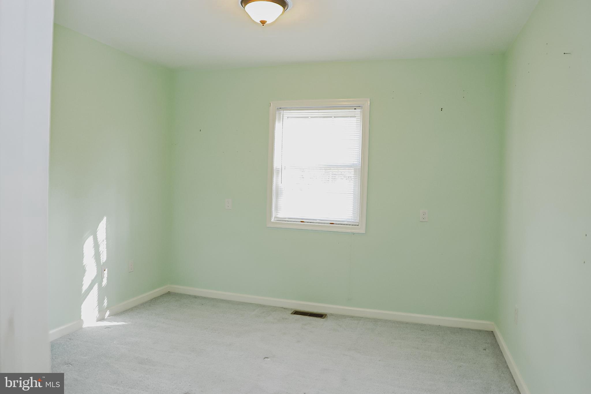 26741 Siloam Road Salisbury, MD 21801 - Photo 18 of 73 2nd BR is beyond the sitting room