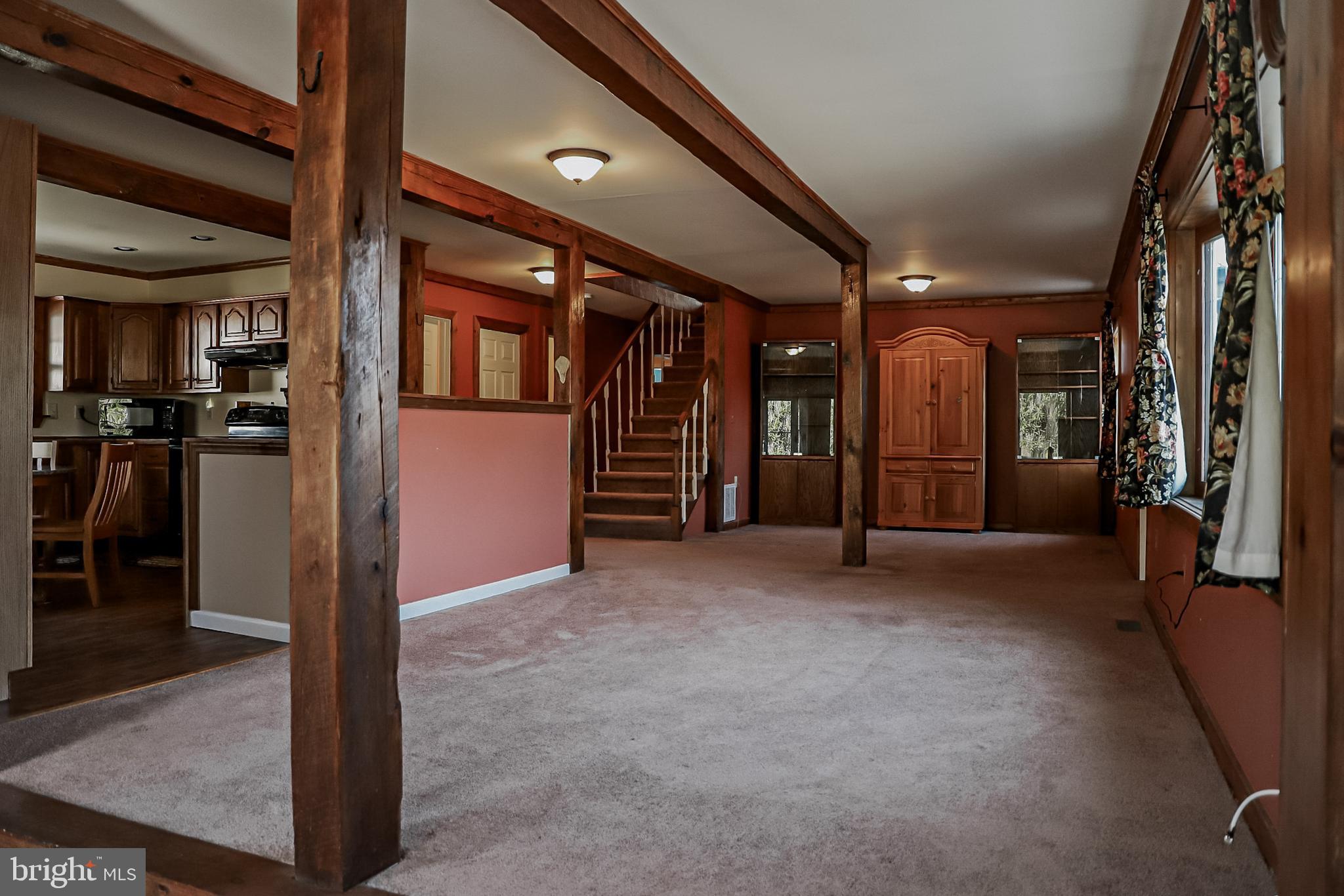 26741 Siloam Road Salisbury, MD 21801 - Photo 5 of 73 Large Living Room has rustic feel