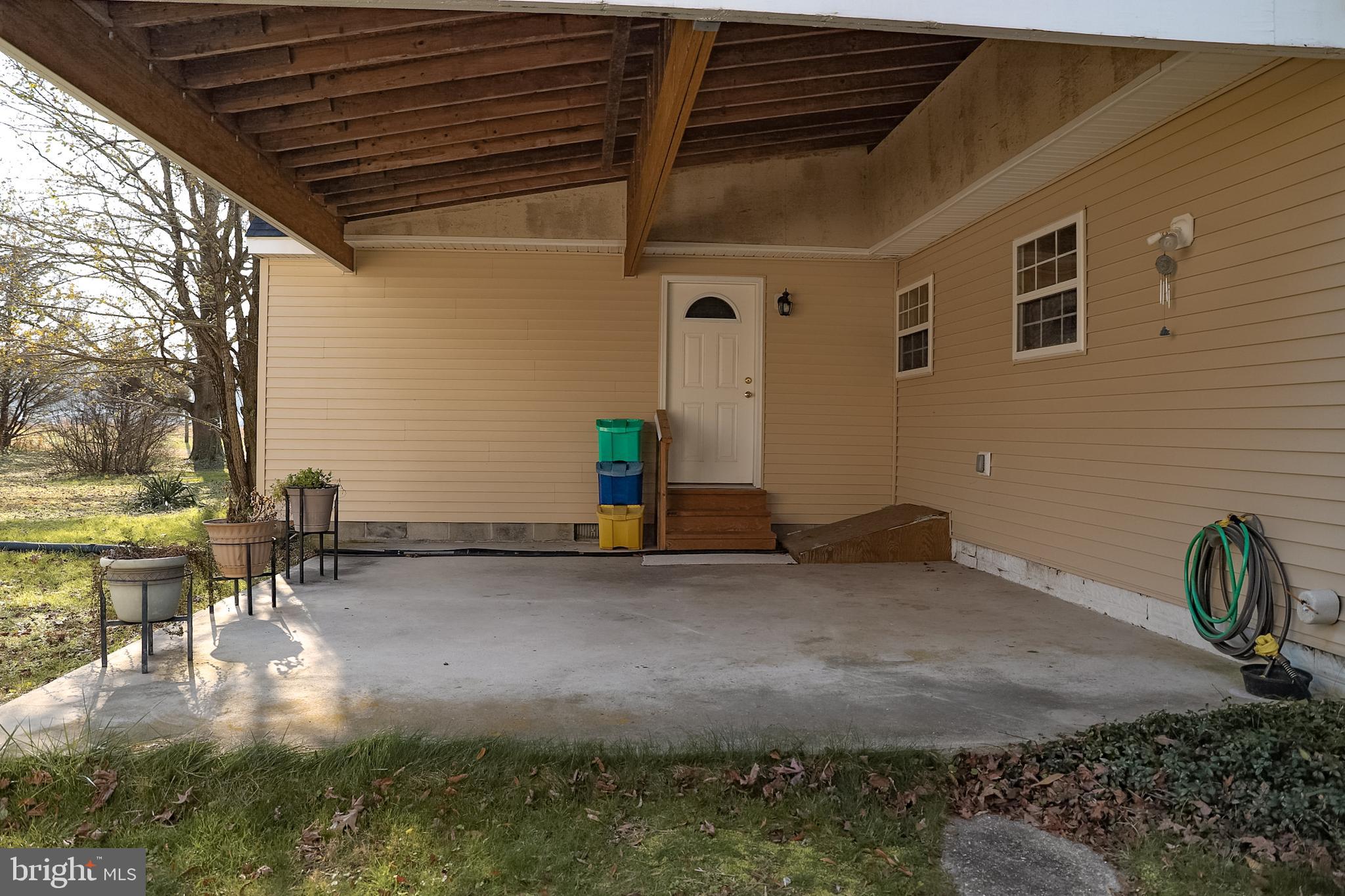 26741 Siloam Road Salisbury, MD 21801 - Photo 66 of 73 Covered patio. Door to sitting room