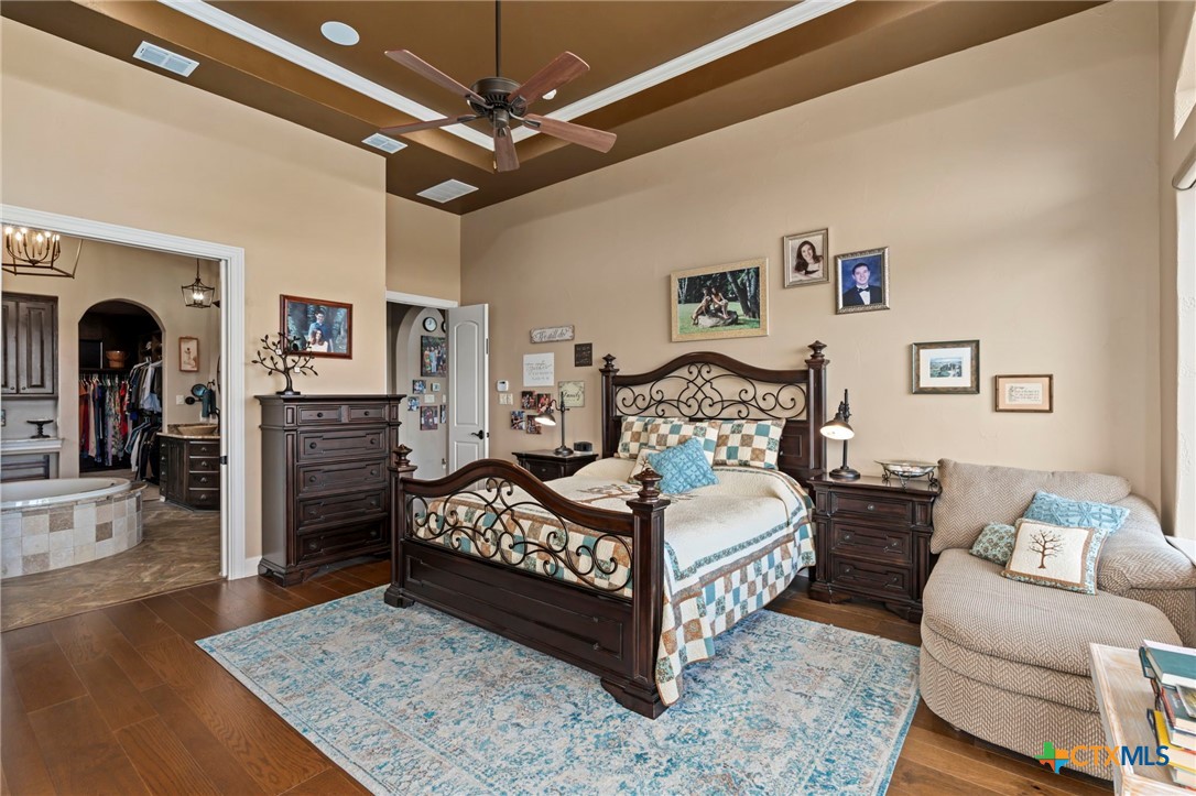 1039 Bluewater Place Spring Branch, TX 78070 - Photo 35 of 48 a bedroom with a bed and ceiling fan